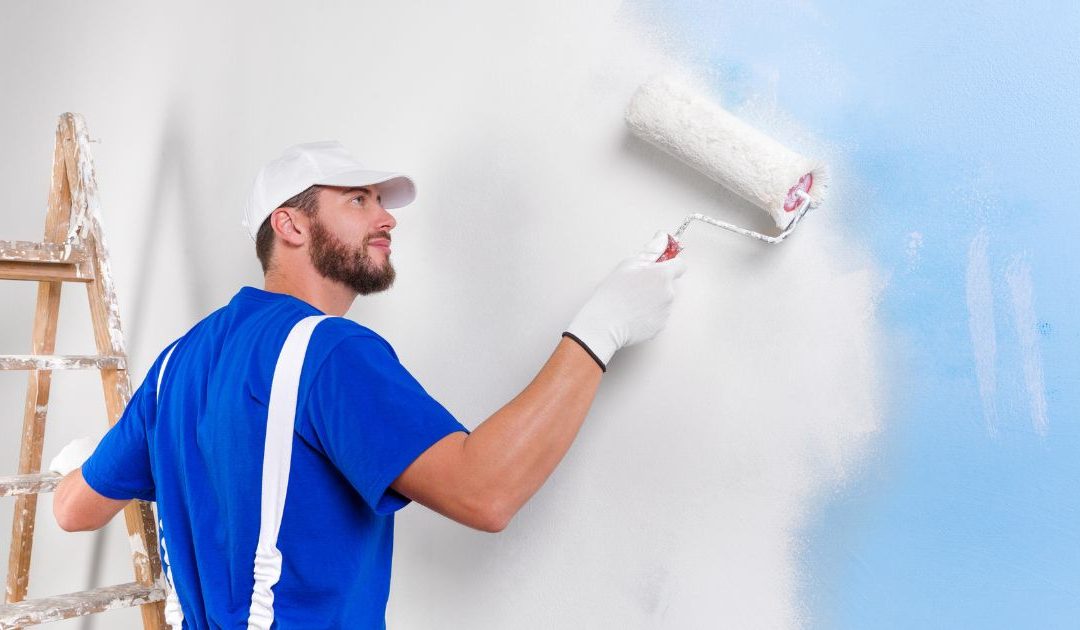 painter painting a wall